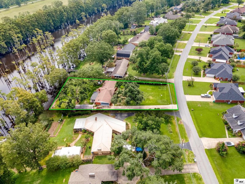 Experience peaceful bayou front living in this beautiful - photo 38