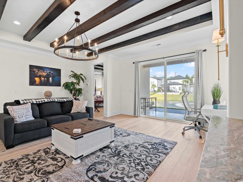 Located in the gated Ocean Villas at 67th community, home to - photo 4
