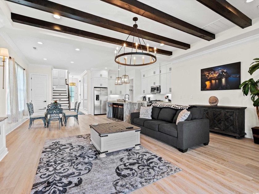Located in the gated Ocean Villas at 67th community, home to - photo 5
