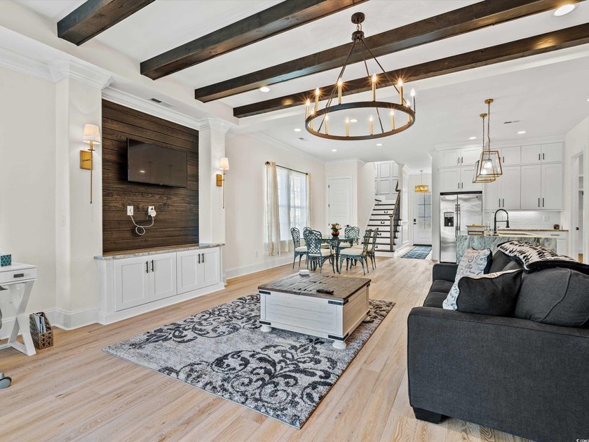 Located in the gated Ocean Villas at 67th community, home to - photo 6