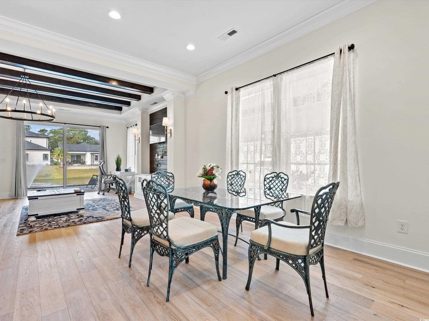 Located in the gated Ocean Villas at 67th community, home to - photo 7