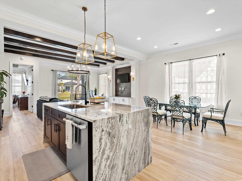 Located in the gated Ocean Villas at 67th community, home to - photo 8
