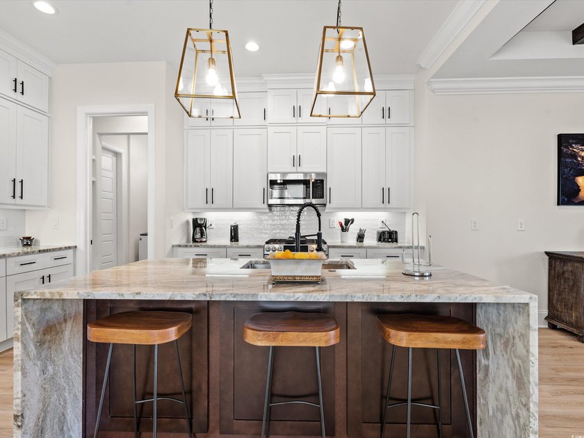 Located in the gated Ocean Villas at 67th community, home to - photo 10