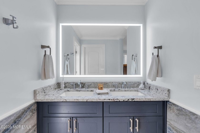 Custom-built in 2023 with water views, this meticulously - photo 33
