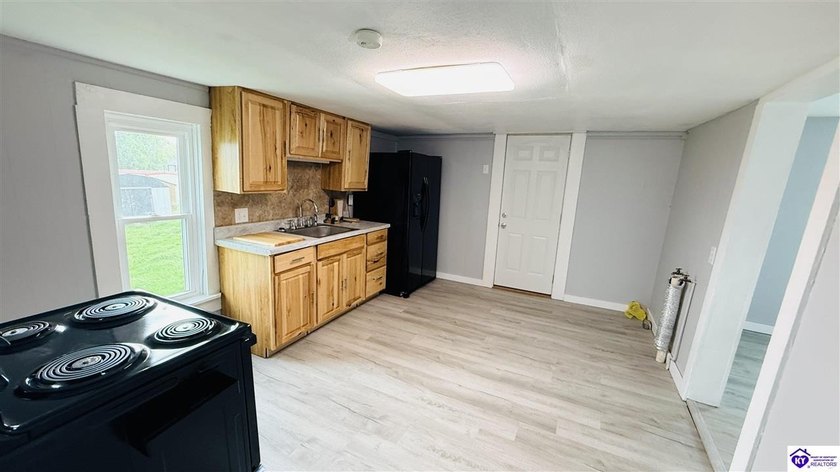 Charming and move-in ready, this 728 sq ft home is conveniently - photo 10
