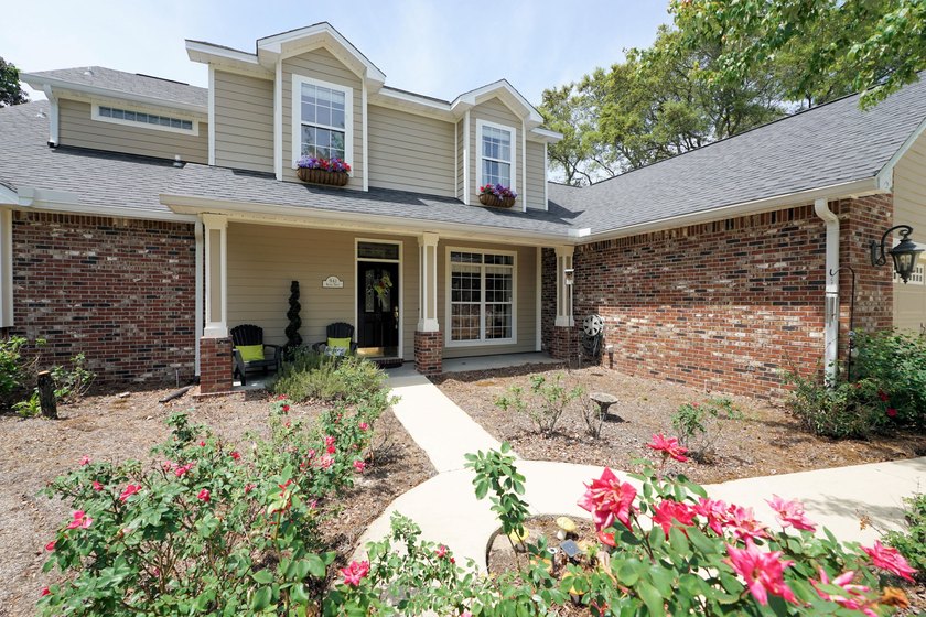 Lovely four-bedroom home situated on a spacious lot in the - photo 3