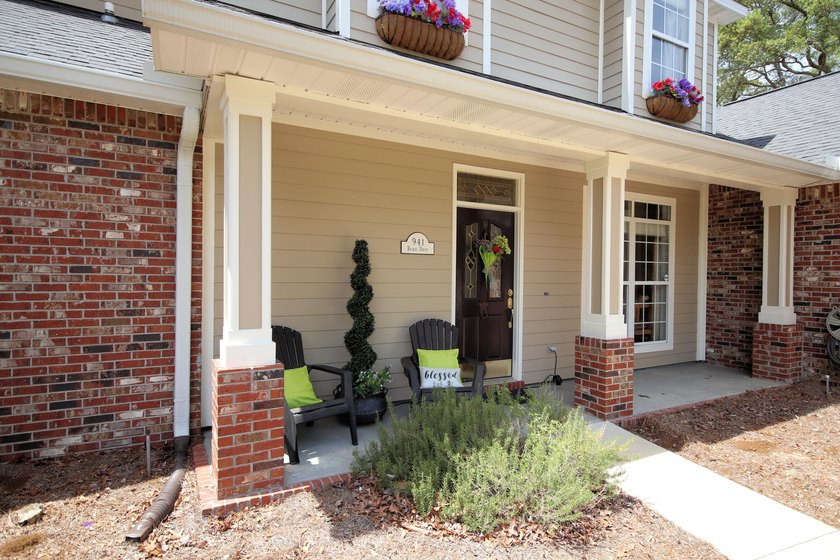 Lovely four-bedroom home situated on a spacious lot in the - photo 5