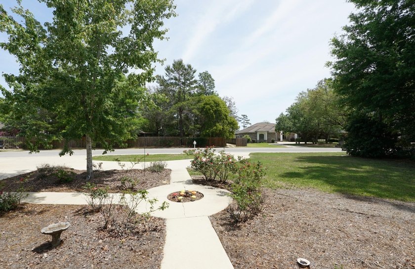 Lovely four-bedroom home situated on a spacious lot in the - photo 6
