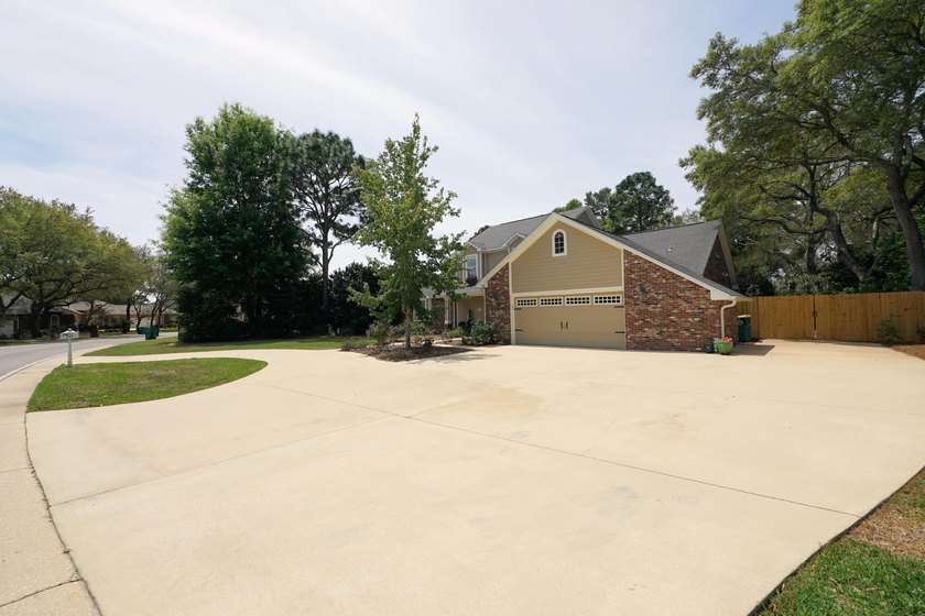 Lovely four-bedroom home situated on a spacious lot in the - photo 8