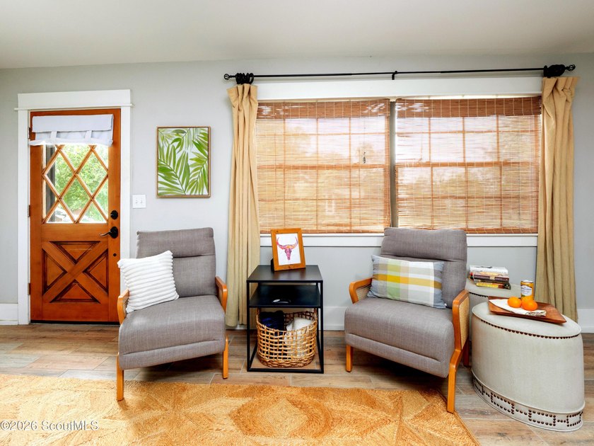 Embrace casual beach town living in this beautifully renovated - photo 2