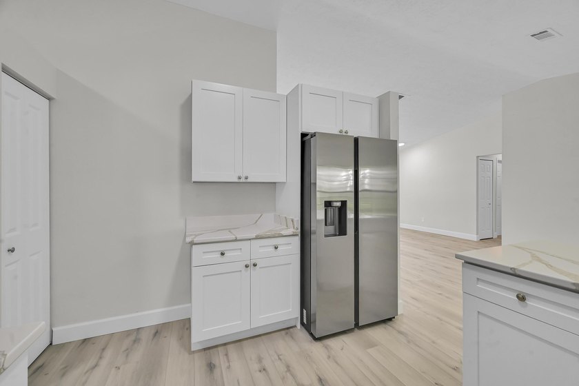 Welcome home to this beautifully remodeled residence nestled in - photo 13