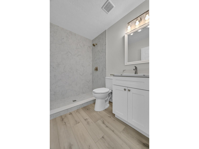 Welcome home to this beautifully remodeled residence nestled in - photo 19