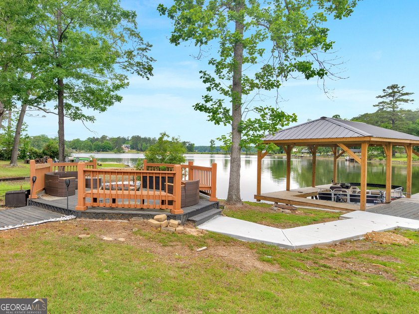 Lakefront Living! Experience serene lakefront living in this - photo 3