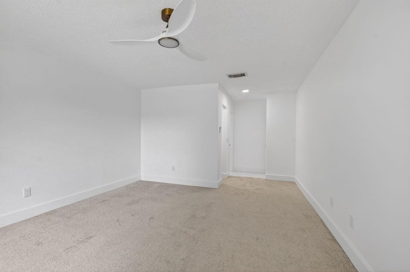 ABSOLUTELY STUNNING FULLY RENOVATED CONDO | BOCA LAGO COMMUNITY - photo 16