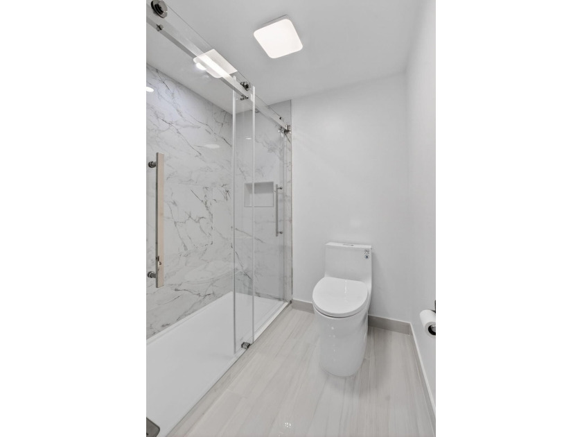 ABSOLUTELY STUNNING FULLY RENOVATED CONDO | BOCA LAGO COMMUNITY - photo 20