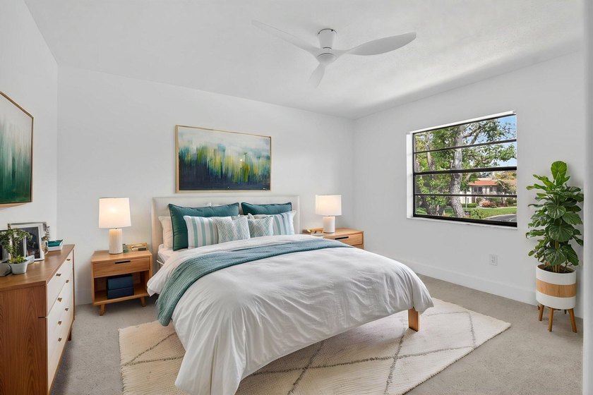 ABSOLUTELY STUNNING FULLY RENOVATED CONDO | BOCA LAGO COMMUNITY - photo 21