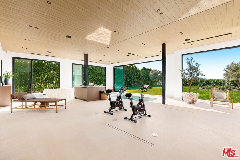 Completed in 2025, this stunning custom estate is sited in the - photo 15