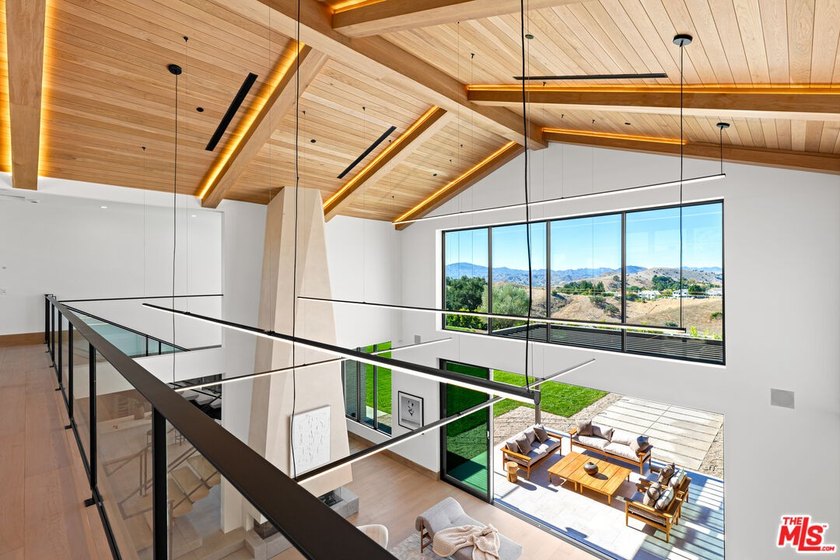 Completed in 2025, this stunning custom estate is sited in the - photo 17