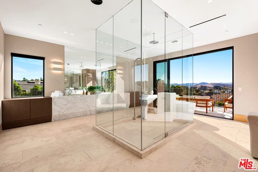 Completed in 2025, this stunning custom estate is sited in the - photo 20