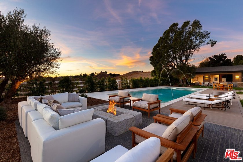 Completed in 2025, this stunning custom estate is sited in the - photo 30