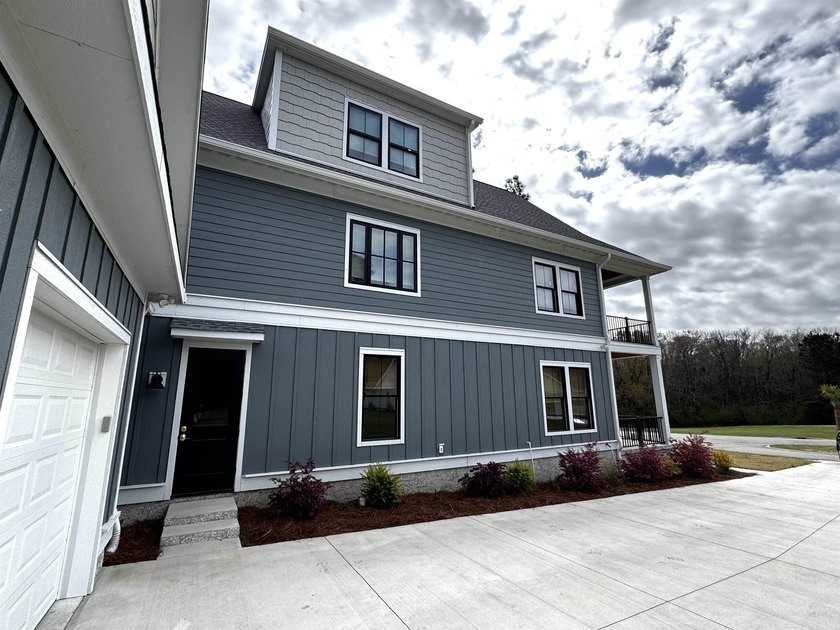 Welcome to your dream home in South Island Plantation, a premier - photo 2