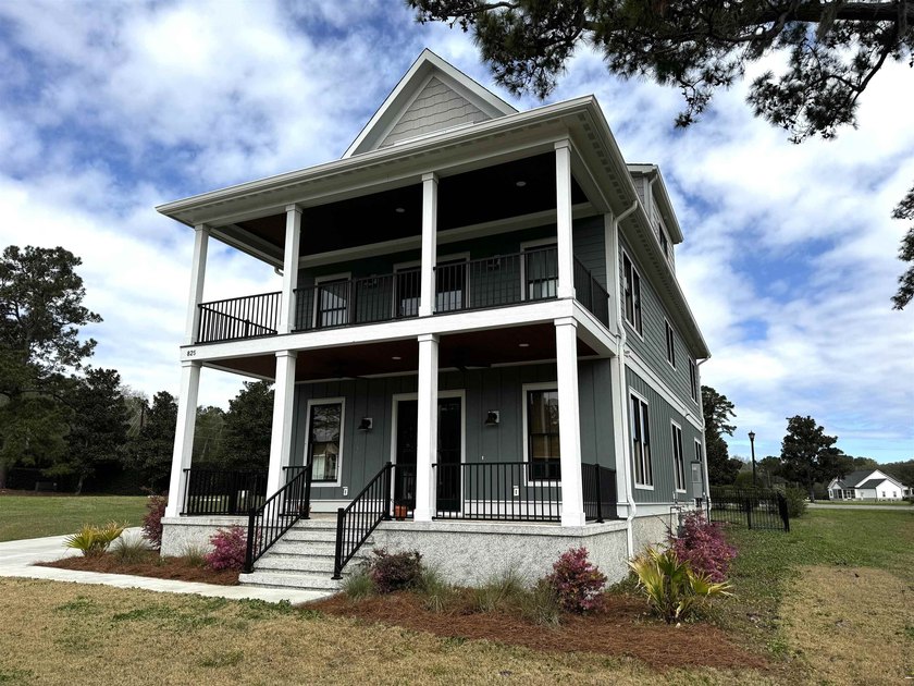 Welcome to your dream home in South Island Plantation, a premier - photo 8