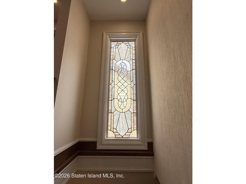 Welcome to this custom-built two-family detached home! This - photo 5