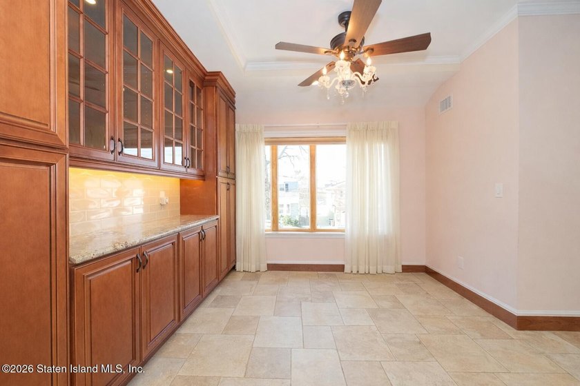 Welcome to this custom-built two-family detached home! This - photo 10