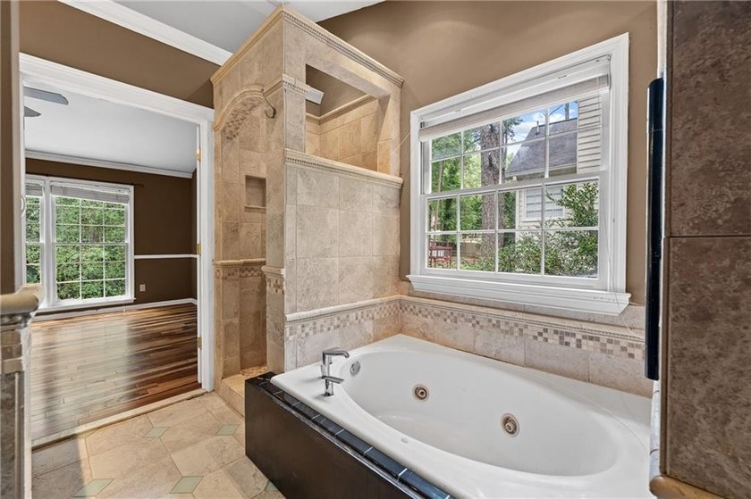 Welcome home to this beautifully maintained brick-front - photo 21