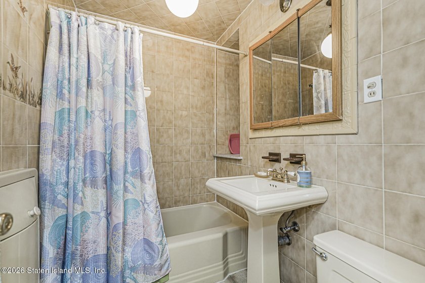 Look no further! Two Family Lg, All Brick Home In BayRidge! LR - photo 4