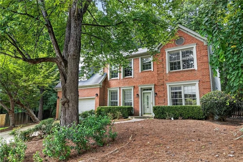 Welcome home to this beautifully maintained brick-front - photo 44