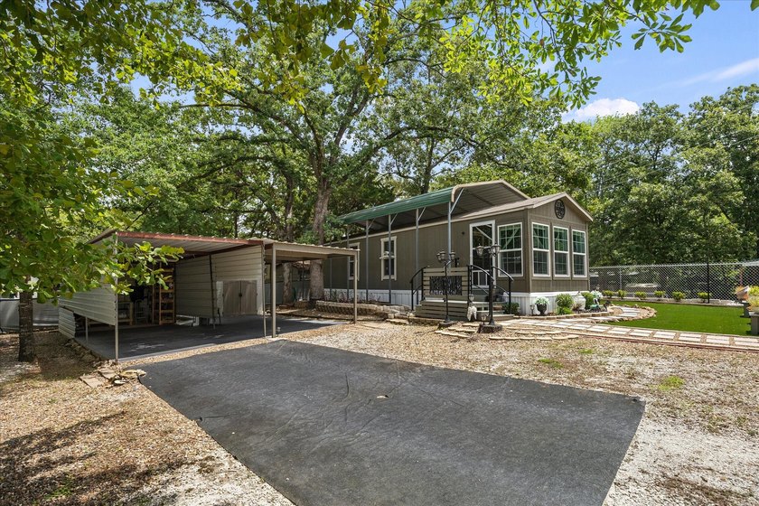 Escape to your own slice of paradise in the sought-after, gated - photo 3
