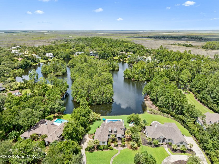 Situated along Stillwater Lake, 191 Stillwater Drive is a custom - photo 2