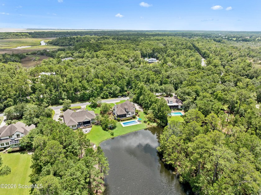 Situated along Stillwater Lake, 191 Stillwater Drive is a custom - photo 4