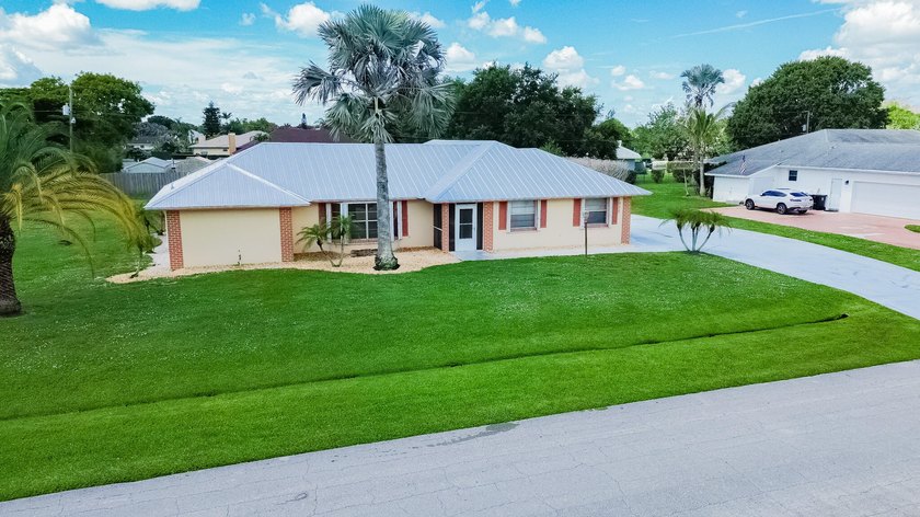 Rare find in Sandpiper Bay! Situated on an expansive .45-acre - photo 32