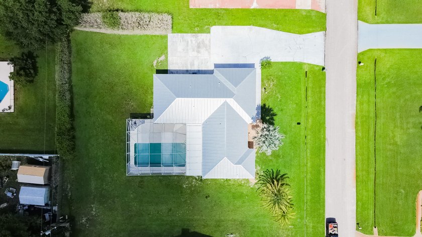 Rare find in Sandpiper Bay! Situated on an expansive .45-acre - photo 36
