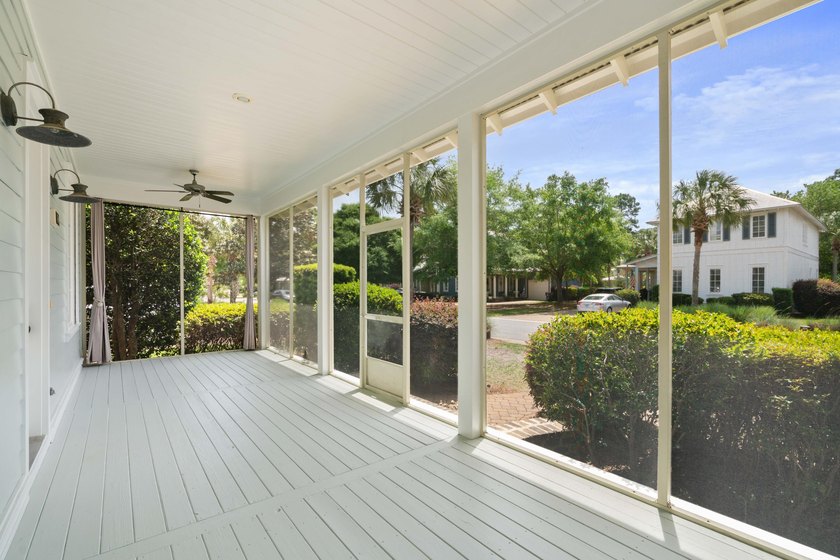 This 3 bed / 2 bath Florida Cottage style home in the lush and - photo 4