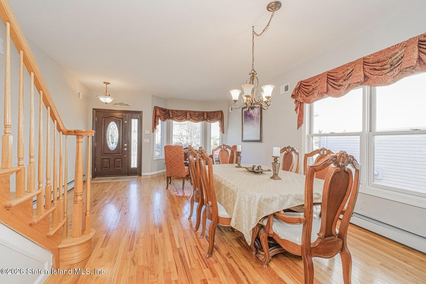 Welcome to 51 Petersons Lane! This legal 2 family side hall - photo 4