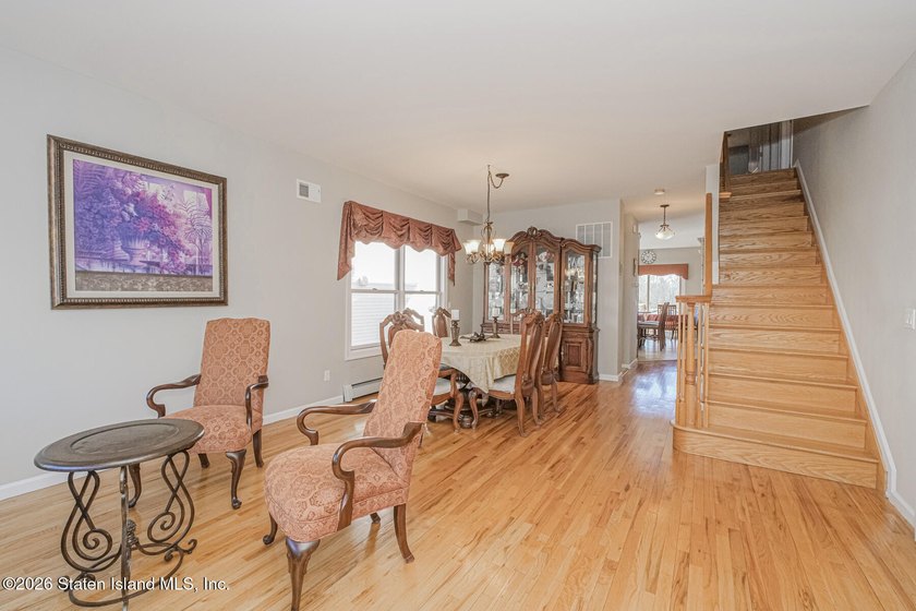 Welcome to 51 Petersons Lane! This legal 2 family side hall - photo 5
