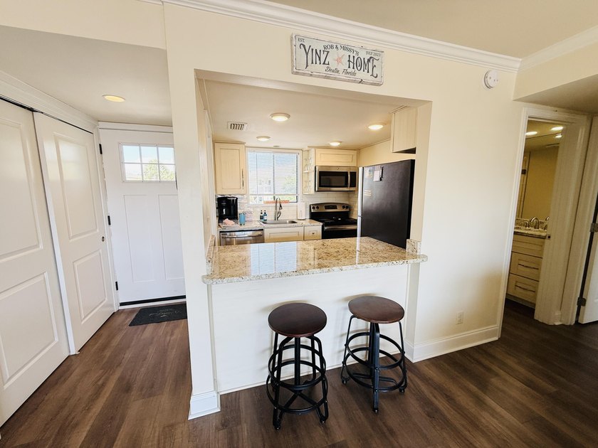 Welcome to this beautifully updated 1-bedroom &amp; rare 1.5-bath - photo 10