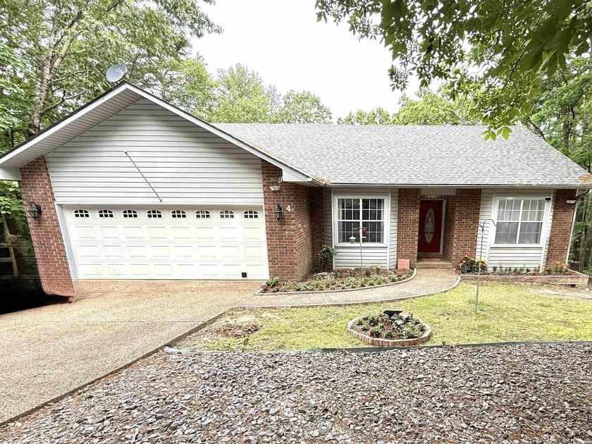 PRICED TO SELL! Tucked away in the trees of Hot Springs Village - photo 2