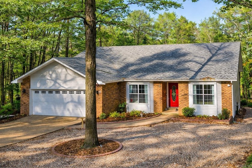PRICED TO SELL! Tucked away in the trees of Hot Springs Village - photo 3