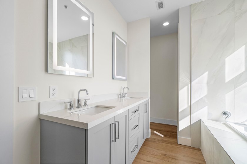 Elevated waterfront living is reimagined in this beautifully - photo 22