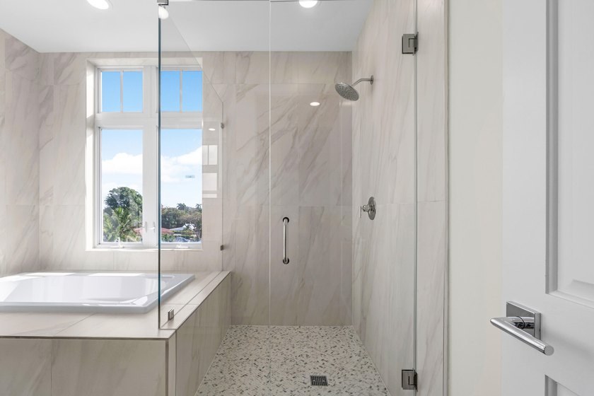 Elevated waterfront living is reimagined in this beautifully - photo 23