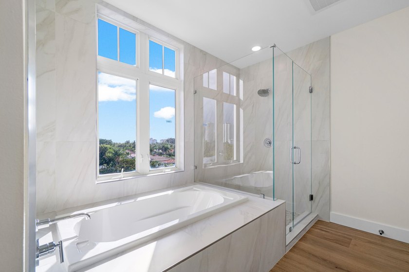 Elevated waterfront living is reimagined in this beautifully - photo 24