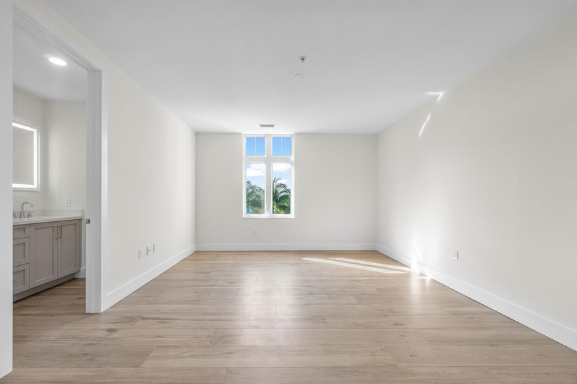 Elevated waterfront living is reimagined in this beautifully - photo 26