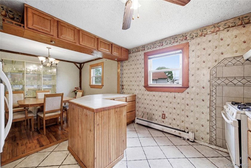 Welcome to this spacious hi-ranch in Bay Shore, offering endless - photo 9