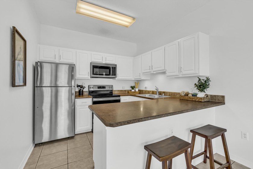 GULF VIEWS! Freshly painted and beautifully updated in 2026! - photo 4