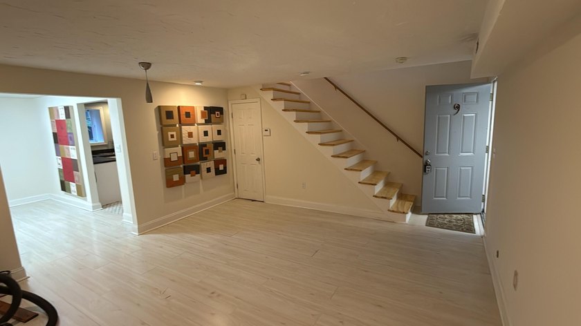 Three-level condominium offering space, flexibility, and a prime - photo 3