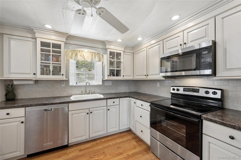 Welcome to a home that blends comfort, elegance, and timeless - photo 4